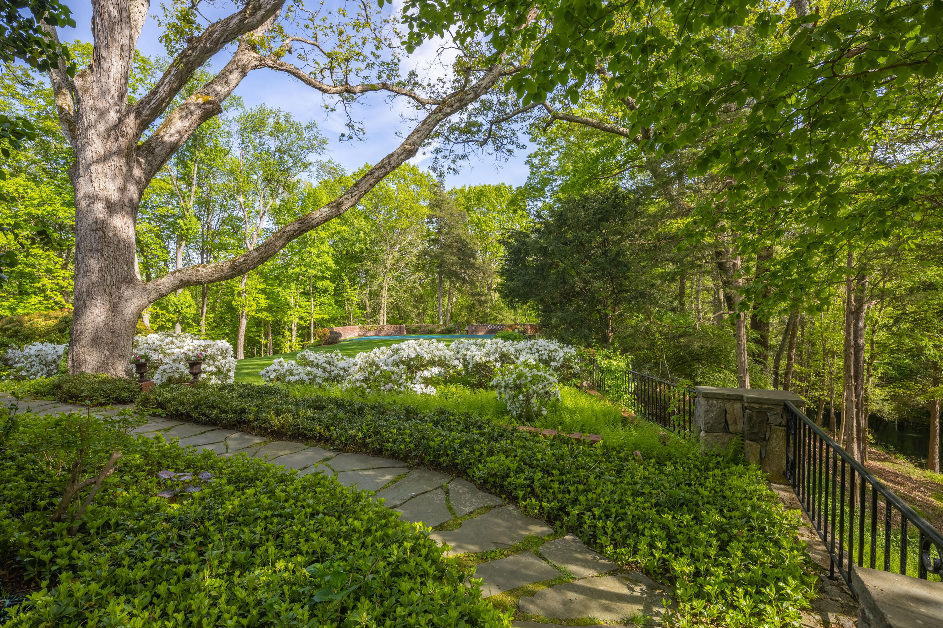 360 Greenley Road New Canaan, CT 06840 - Photo 18 of 22 a view of a garden