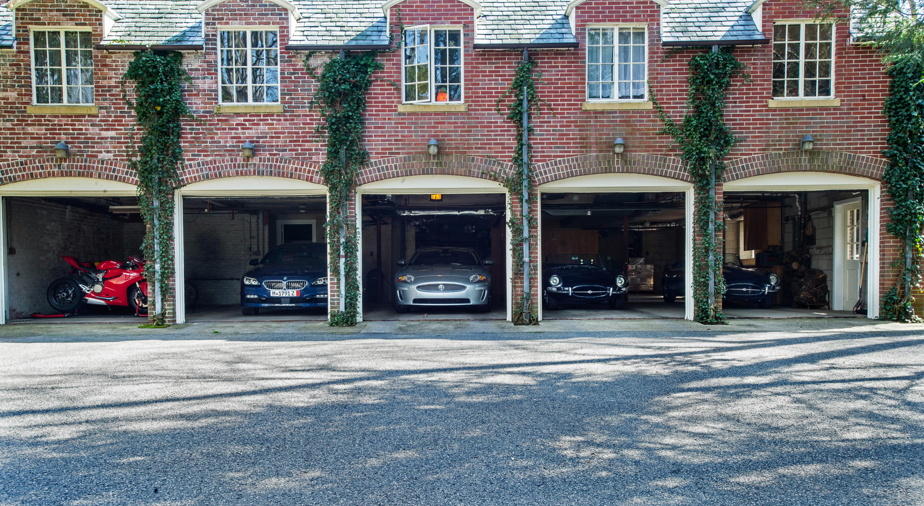360 Greenley Road New Canaan, CT 06840 - Photo 21 of 22 a view of a brick building with many windows