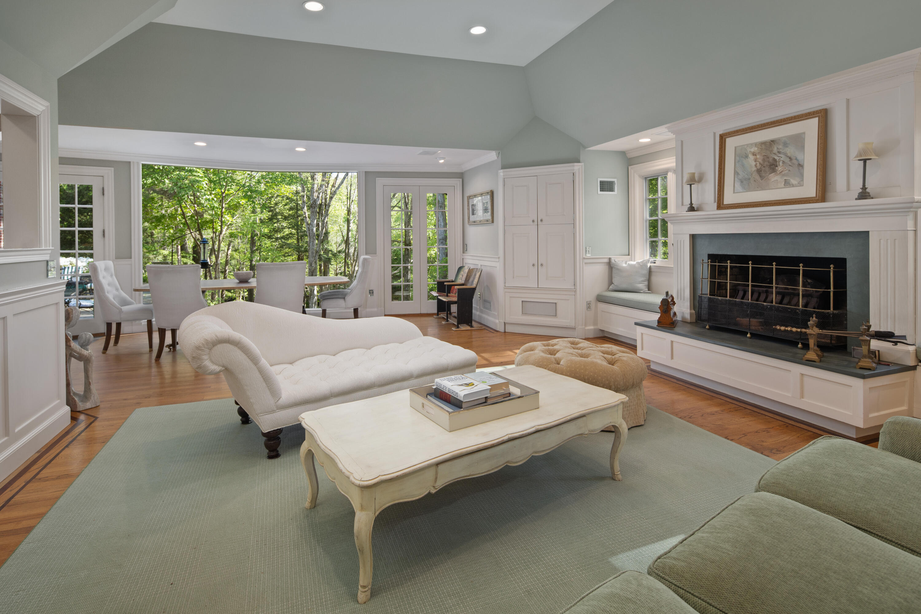 360 Greenley Road New Canaan, CT 06840 - Photo 8 of 22 a living room with furniture and a fireplace