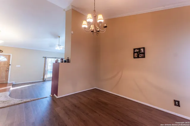 a view of a livingroom with wooden floor