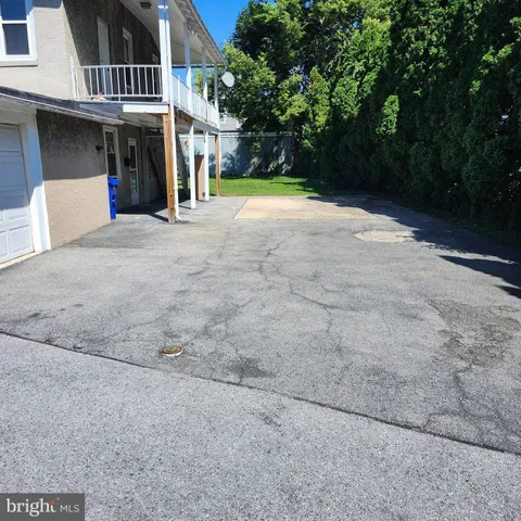 a view of a street with a house