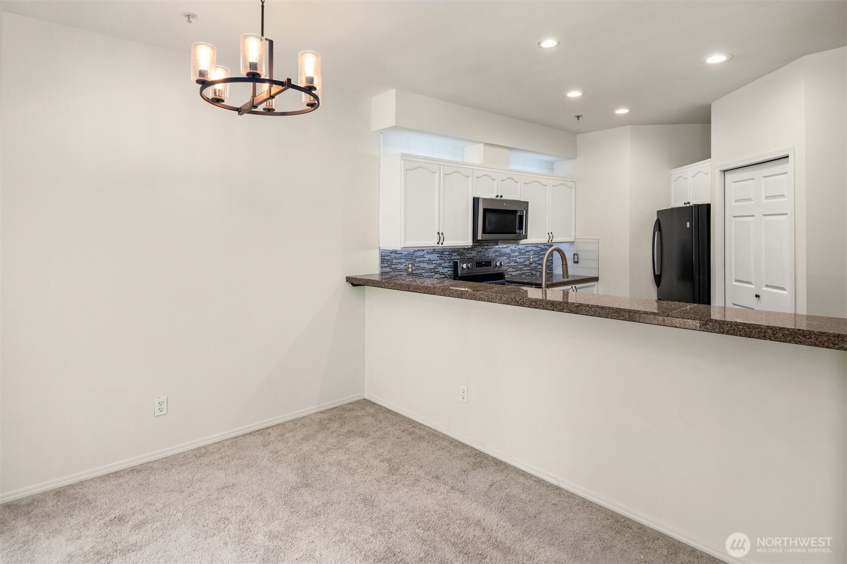 12113 Northeast 172nd Place, Unit J202 Bothell, WA 98011 - Photo 4 of 34