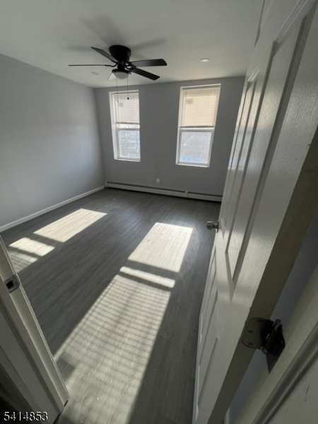 21 Alva Street, Unit 2 Bloomfield, NJ 07003 - Photo 13 of 16 a view of an empty room and window