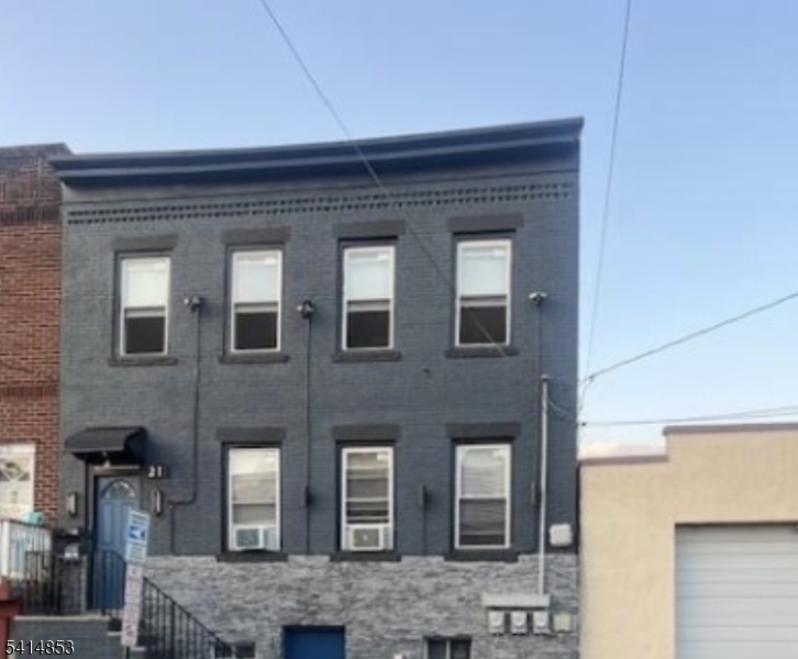 21 Alva Street, Unit 2 Bloomfield, NJ 07003 - Photo 2 of 16 a brick building with windows
