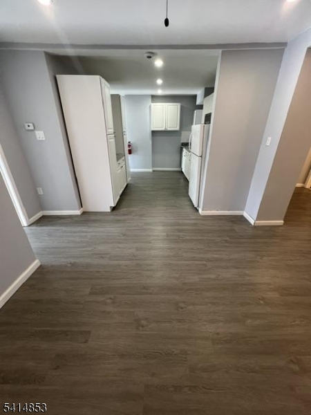 21 Alva Street, Unit 2 Bloomfield, NJ 07003 - Photo 5 of 16 a view of empty room with wooden floor