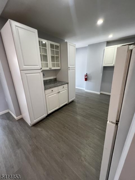 21 Alva Street, Unit 2 Bloomfield, NJ 07003 - Photo 8 of 16 a view of kitchen with wooden floor and electronic appliances