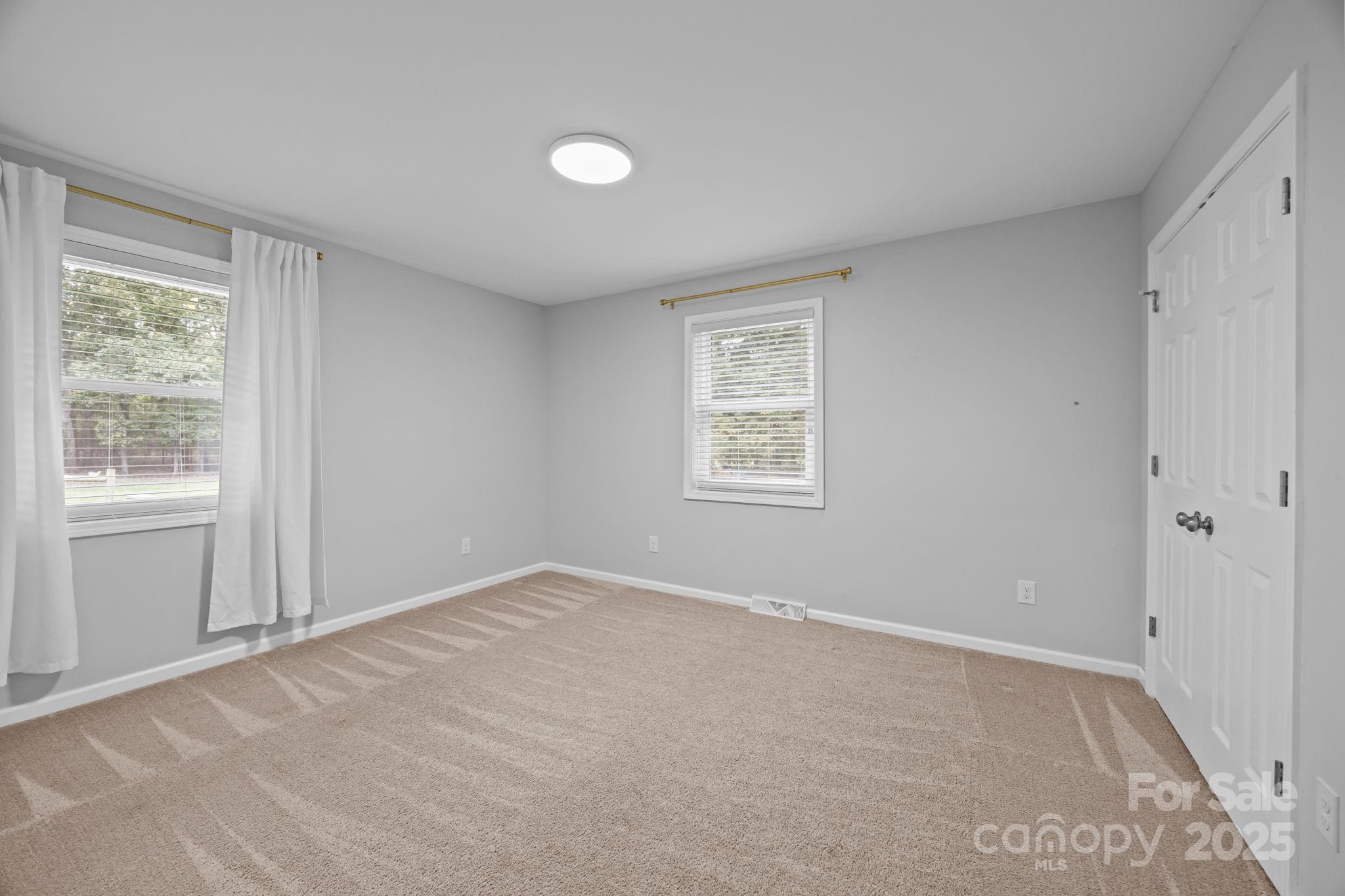 1813 Doster Road Monroe, NC 28112 - Photo 16 of 47 a view of an empty room with a window