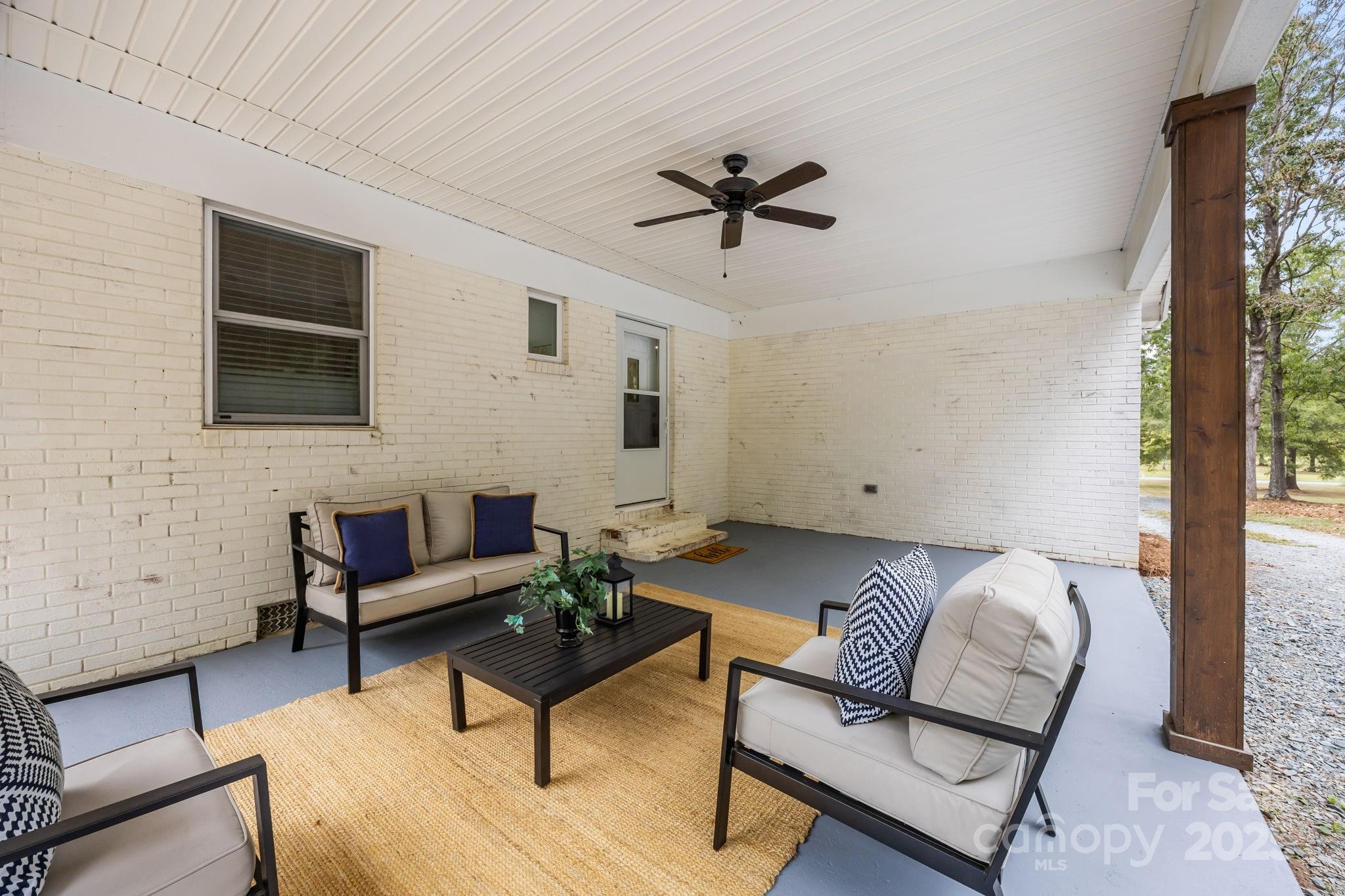 1813 Doster Road Monroe, NC 28112 - Photo 22 of 47 a living room with furniture