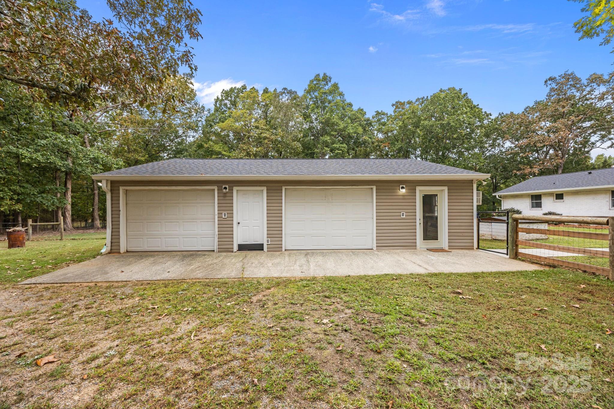 1813 Doster Road Monroe, NC 28112 - Photo 25 of 47 front view of a house with a yard