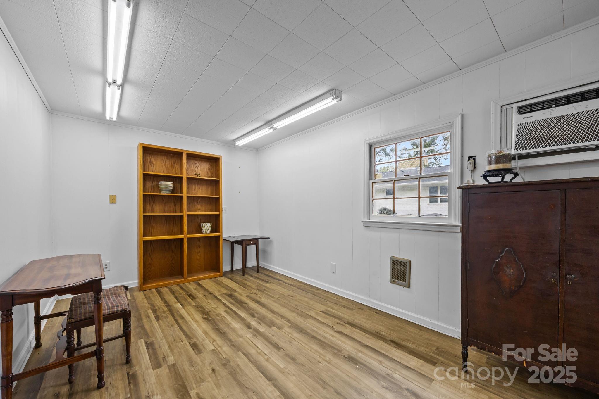 1813 Doster Road Monroe, NC 28112 - Photo 26 of 47 a bedroom with a bed and a window