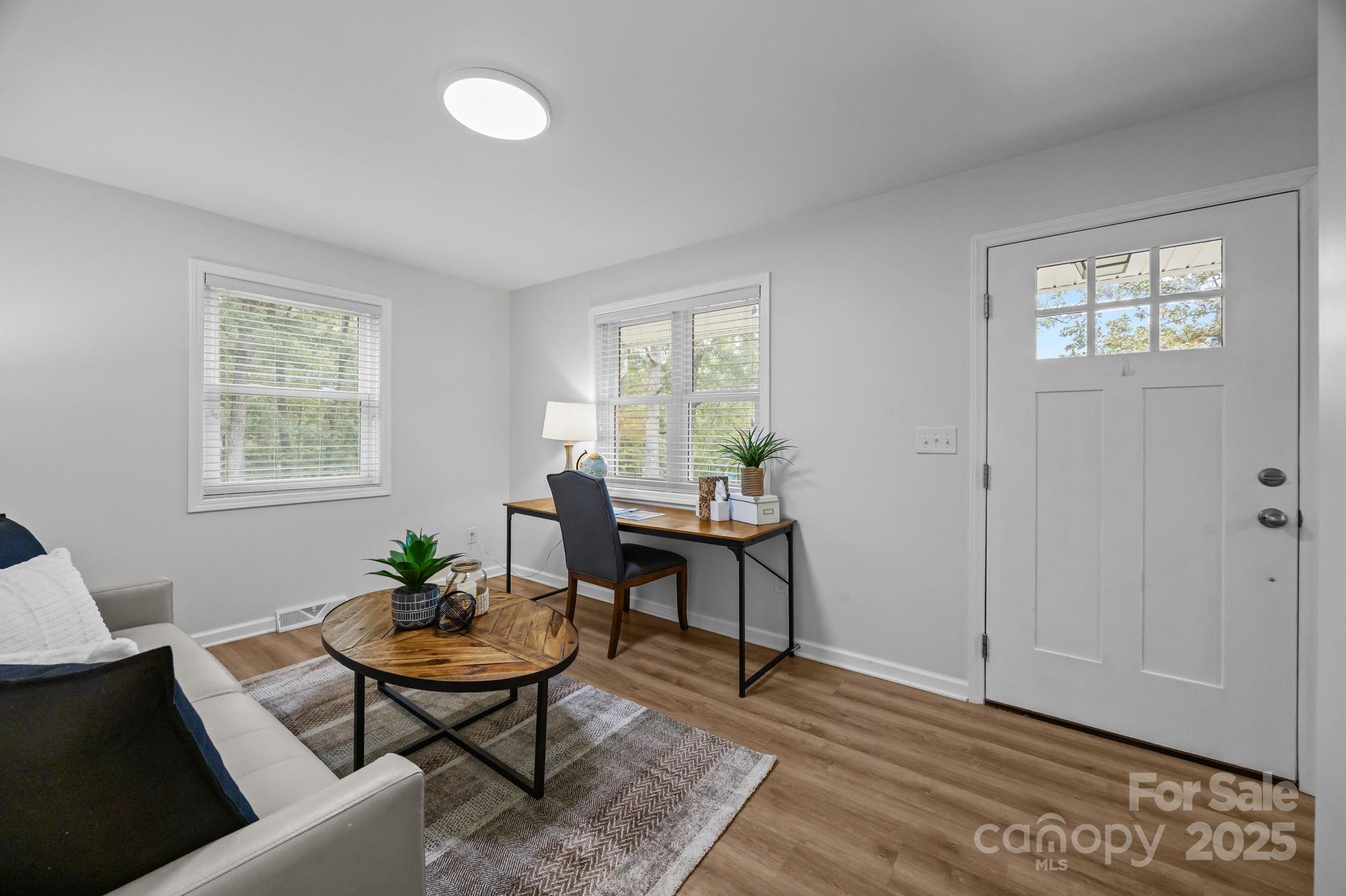1813 Doster Road Monroe, NC 28112 - Photo 3 of 47 a view of a livingroom with furniture and window
