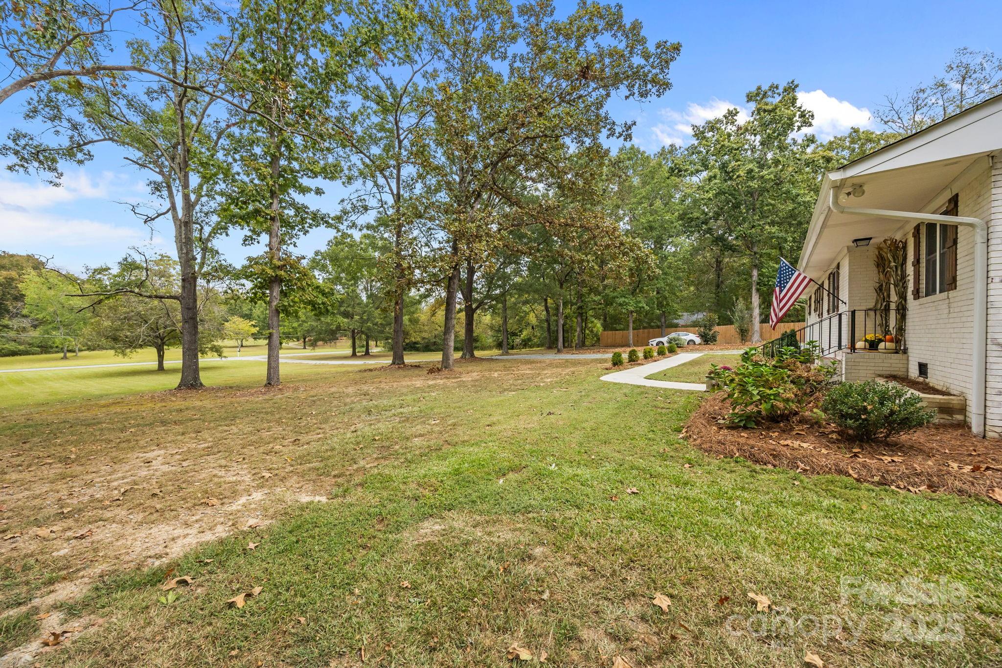 1813 Doster Road Monroe, NC 28112 - Photo 37 of 47 a view of yard with tree