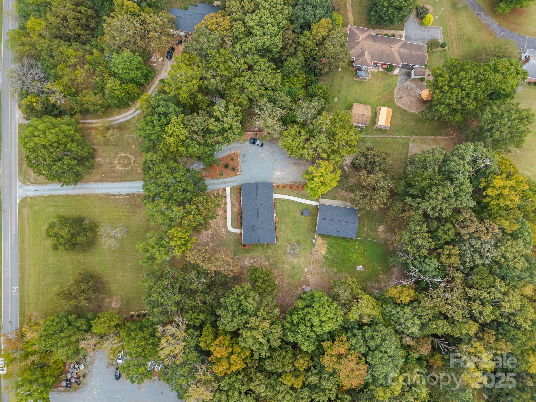 1813 Doster Road Monroe, NC 28112 - Photo 43 of 47 an aerial view of a house with a yard