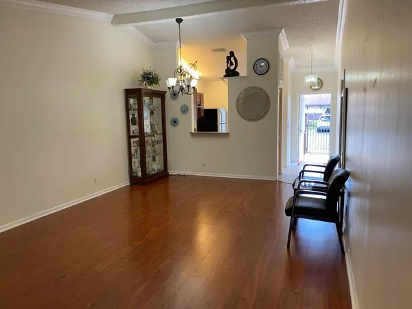a view of livingroom with furniture and wooden floor