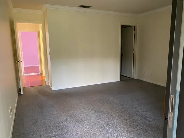 an empty room with windows