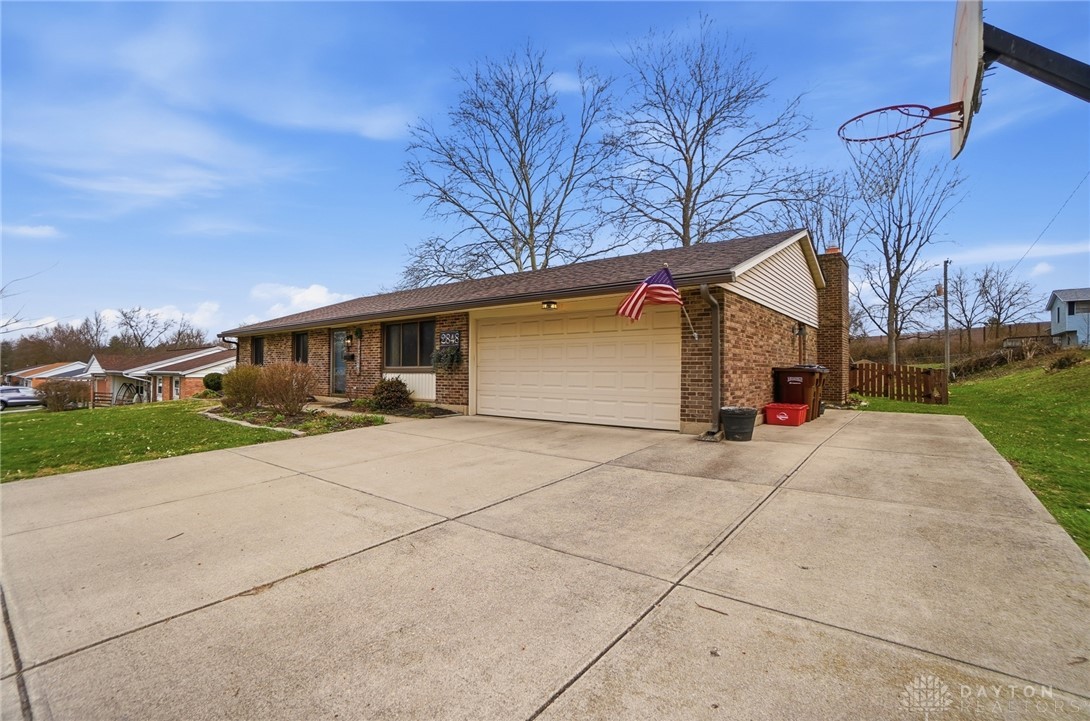 2848 Ellen Lane Dayton, OH 45430 - Photo 61 of 62 This charming residence features a spacious driveway and an inviting exterior.