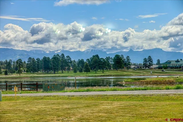 a view of a big building with a big yard