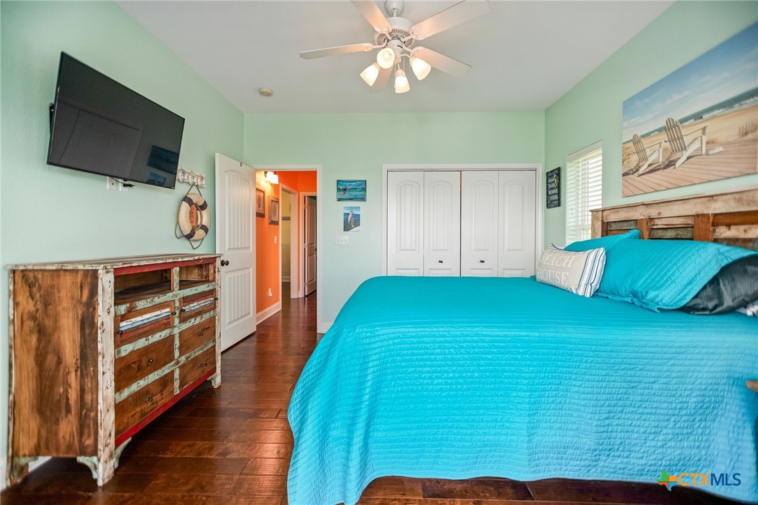 23 Macey Street Port O'Connor, TX 77982 - Photo 30 of 47 a room with furniture and a flat screen tv