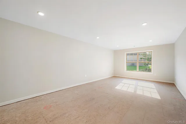 a bathroom with a sink a mirror and a light fixture