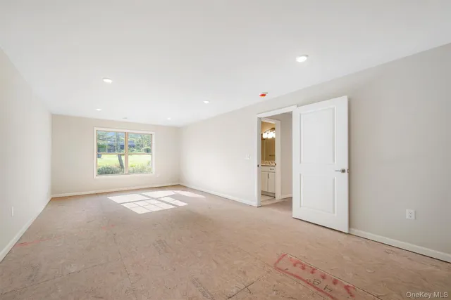 an empty room with an entryway