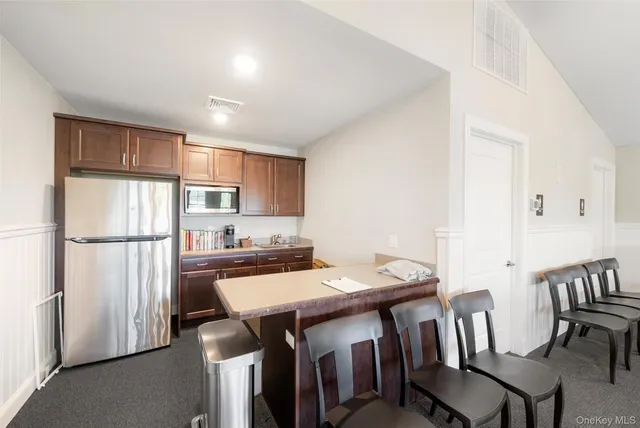 a view of houses with outdoor seating