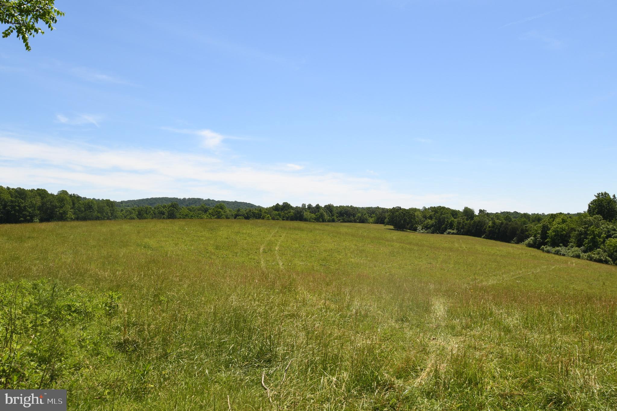 Slate Mills Road Sperryville, VA 22740 - Photo 2 of 12 a view of a lake and green valley