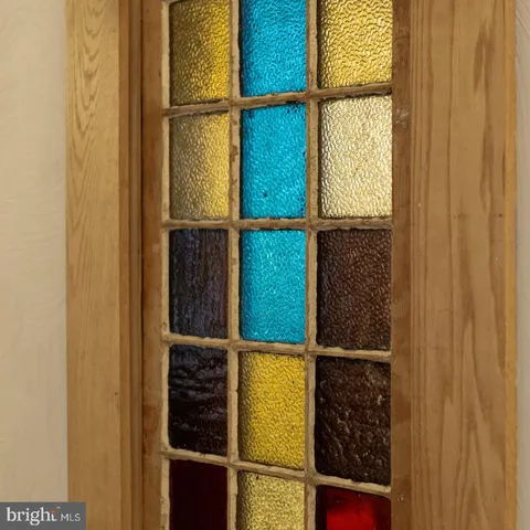 a bedroom with a bed and dresser