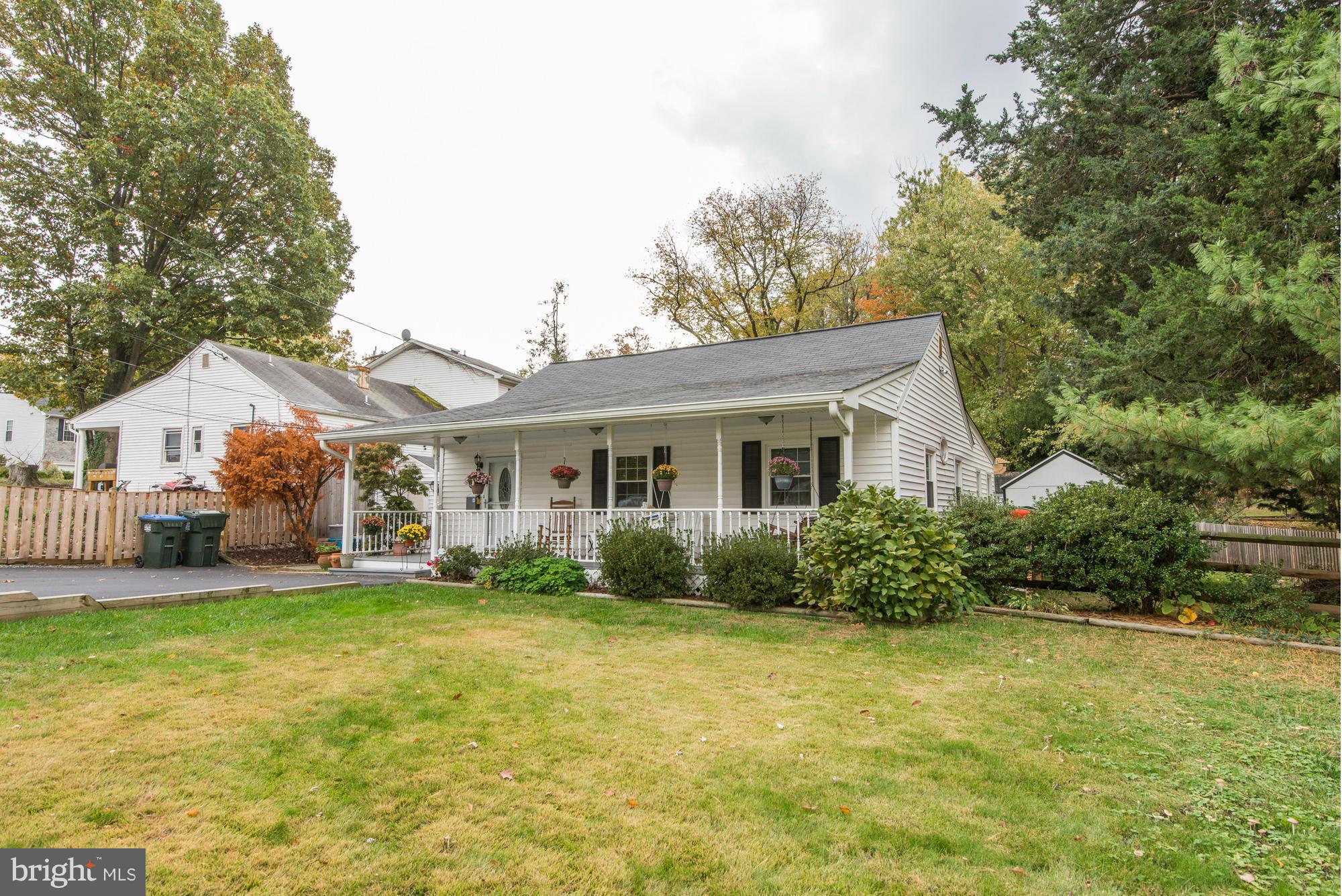 2034 Griffith Road Falls Church, VA 22043 - Photo 2 of 25 a front view of a house with garden
