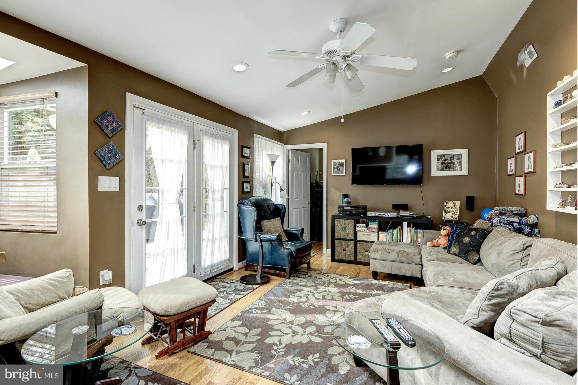2034 Griffith Road Falls Church, VA 22043 - Photo 12 of 25 a living room with furniture and a flat screen tv