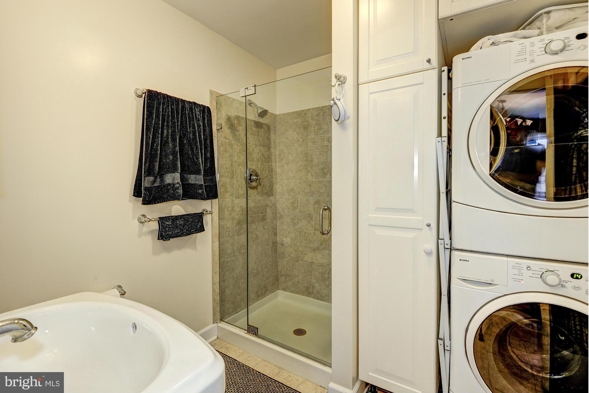 2034 Griffith Road Falls Church, VA 22043 - Photo 14 of 25 a bathroom with a sink a toilet and shower