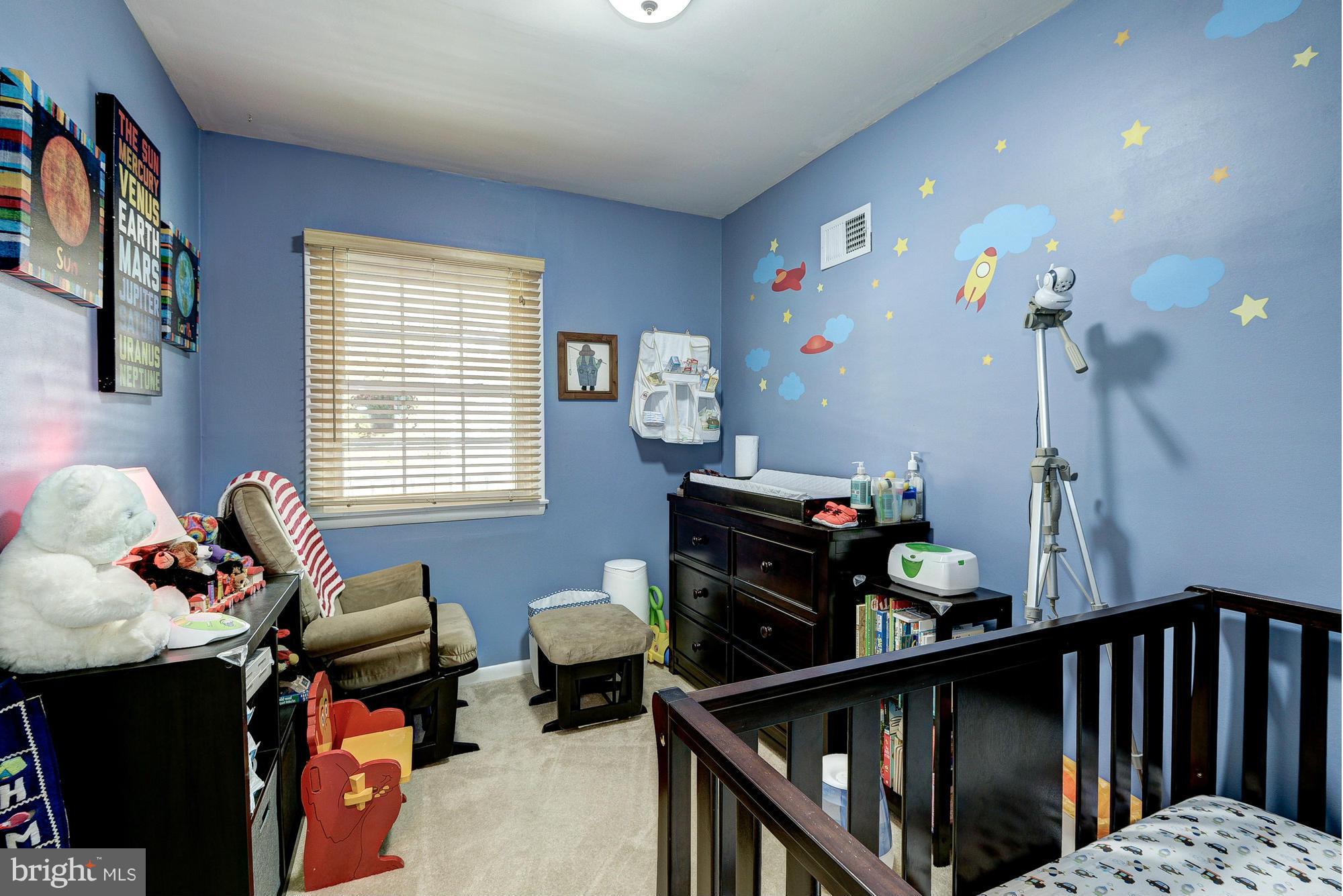 2034 Griffith Road Falls Church, VA 22043 - Photo 15 of 25 a view of a workspace with furniture and a window