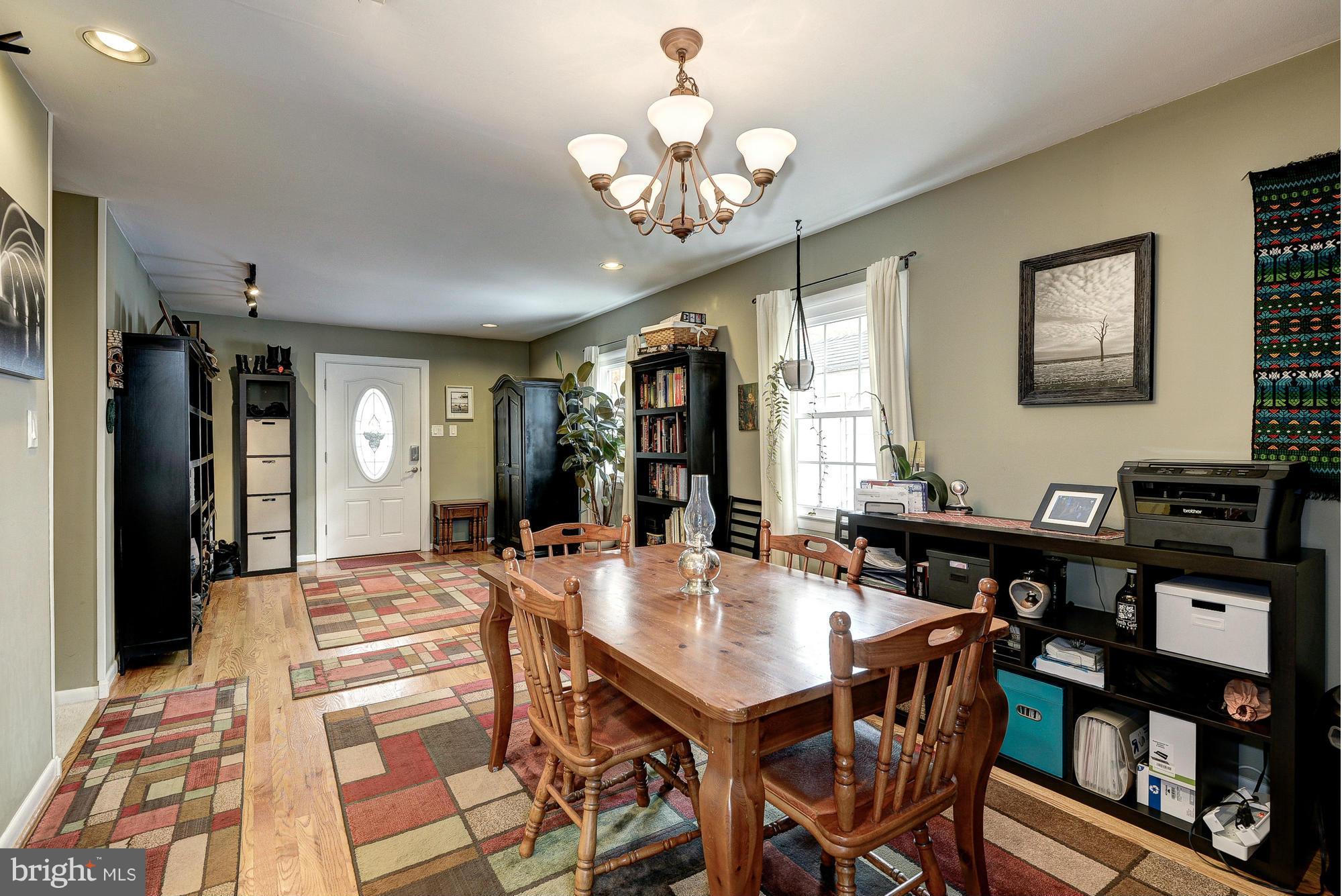 2034 Griffith Road Falls Church, VA 22043 - Photo 7 of 25 a view of a dining room with furniture and chandelier