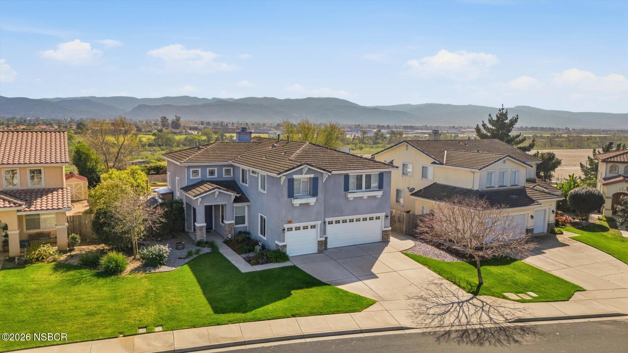 280 Rinconcito Lompoc, CA 93436 - Photo 3 of 52 an aerial view of a house with a garden and lake view
