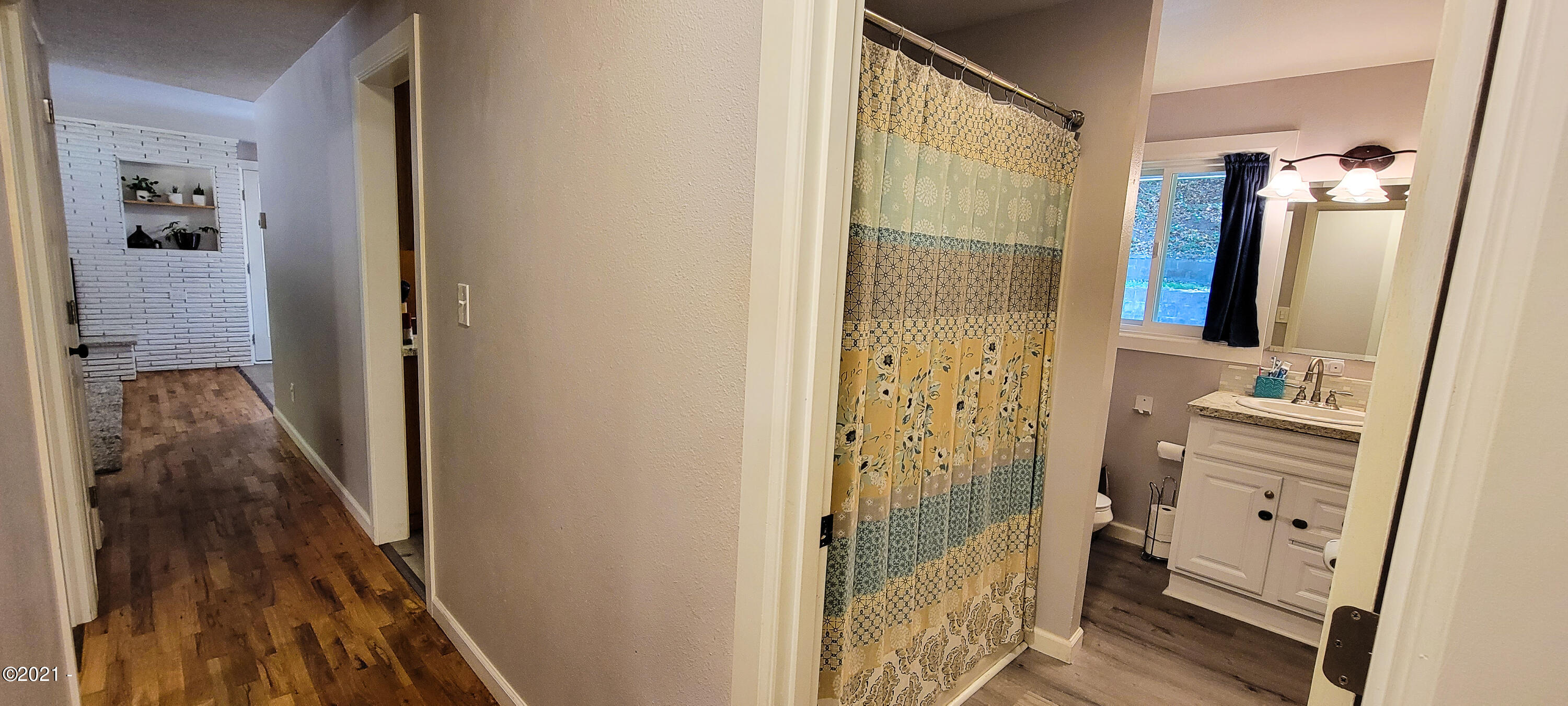 1449 Southeast Ammon Road Toledo, OR 97391 - Photo 16 of 32 Hall into Bathroom