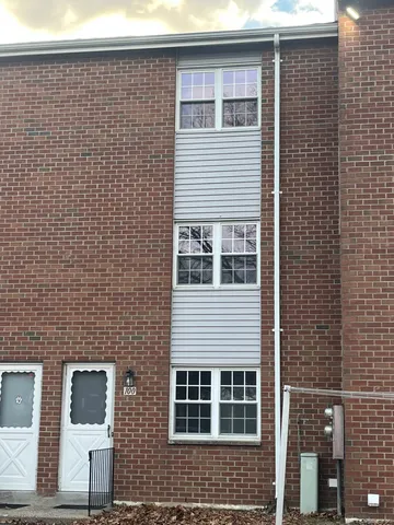 a view of a garden with a tree