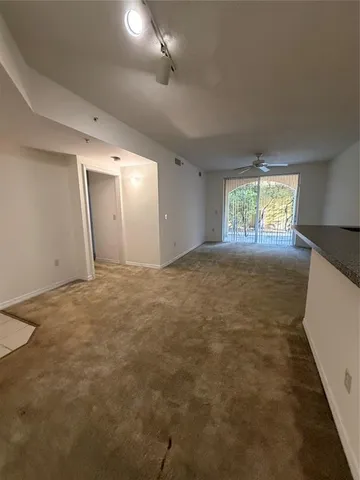 a view of an empty room and window