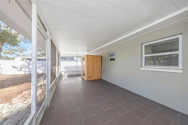 a view of hallway with livingroom