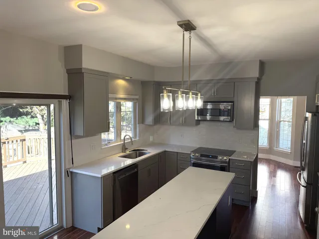 a view of hallway with windows