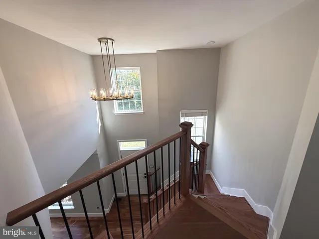 a spacious bathroom with a bathtub a sink and a shower