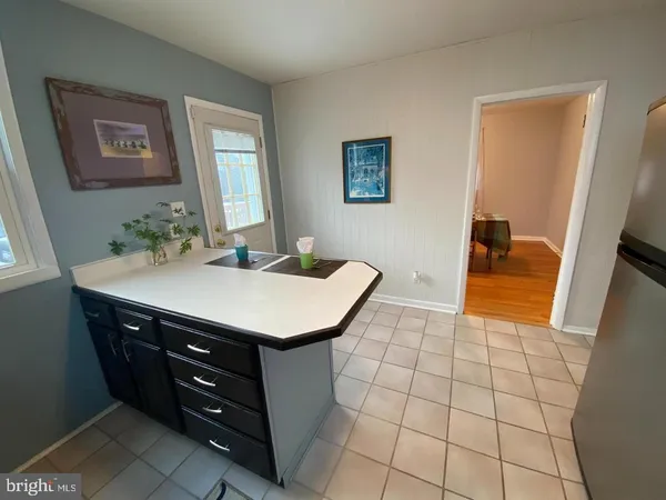 a bathroom with a sink a vanity and a mirror