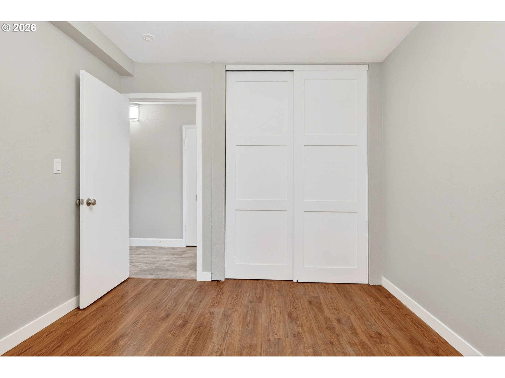 4 Touchstone, Unit 151 Lake Oswego, OR 97035 - Photo 22 of 28 a view of an empty room with wooden floor