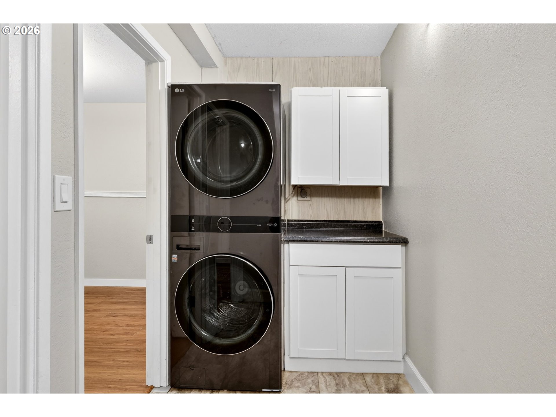 4 Touchstone, Unit 151 Lake Oswego, OR 97035 - Photo 23 of 28 a close view of a utility room with dryer and washer