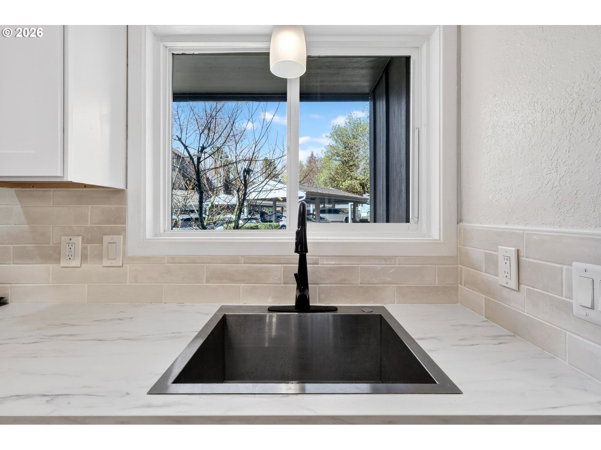 4 Touchstone, Unit 151 Lake Oswego, OR 97035 - Photo 7 of 28 a kitchen with a sink and a window