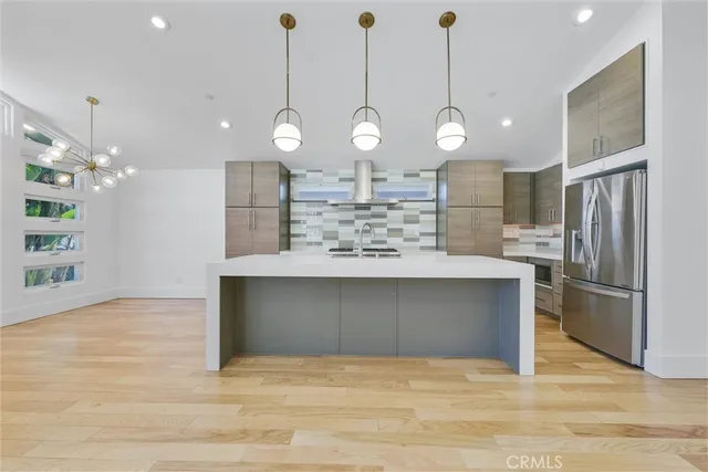 a view of front door and potted plants