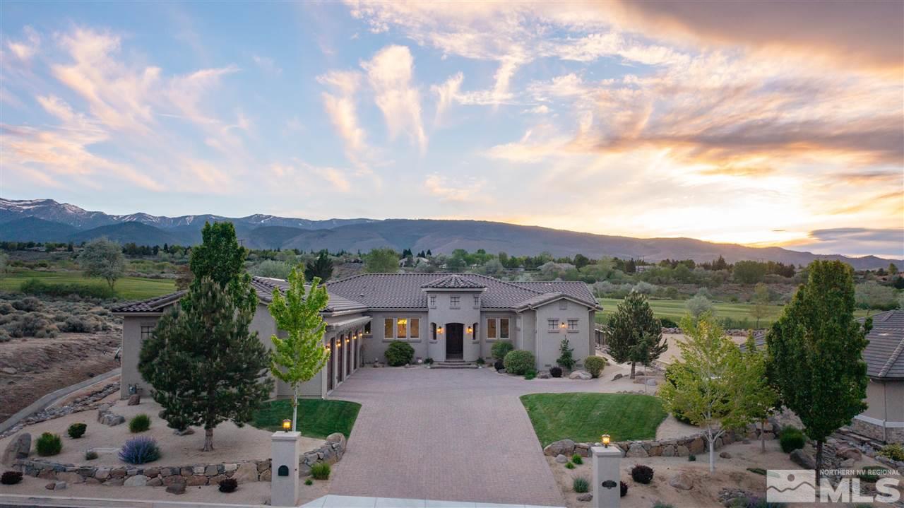 12835 Silver Wolf Road Reno, NV 89511 - Photo 1 of 31 an aerial view of a house with a garden