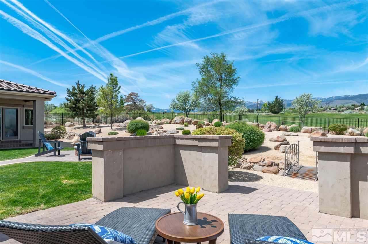 12835 Silver Wolf Road Reno, NV 89511 - Photo 19 of 31 a view of a chairs and table in the patio