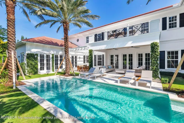 a view of an house with backyard porch and patio