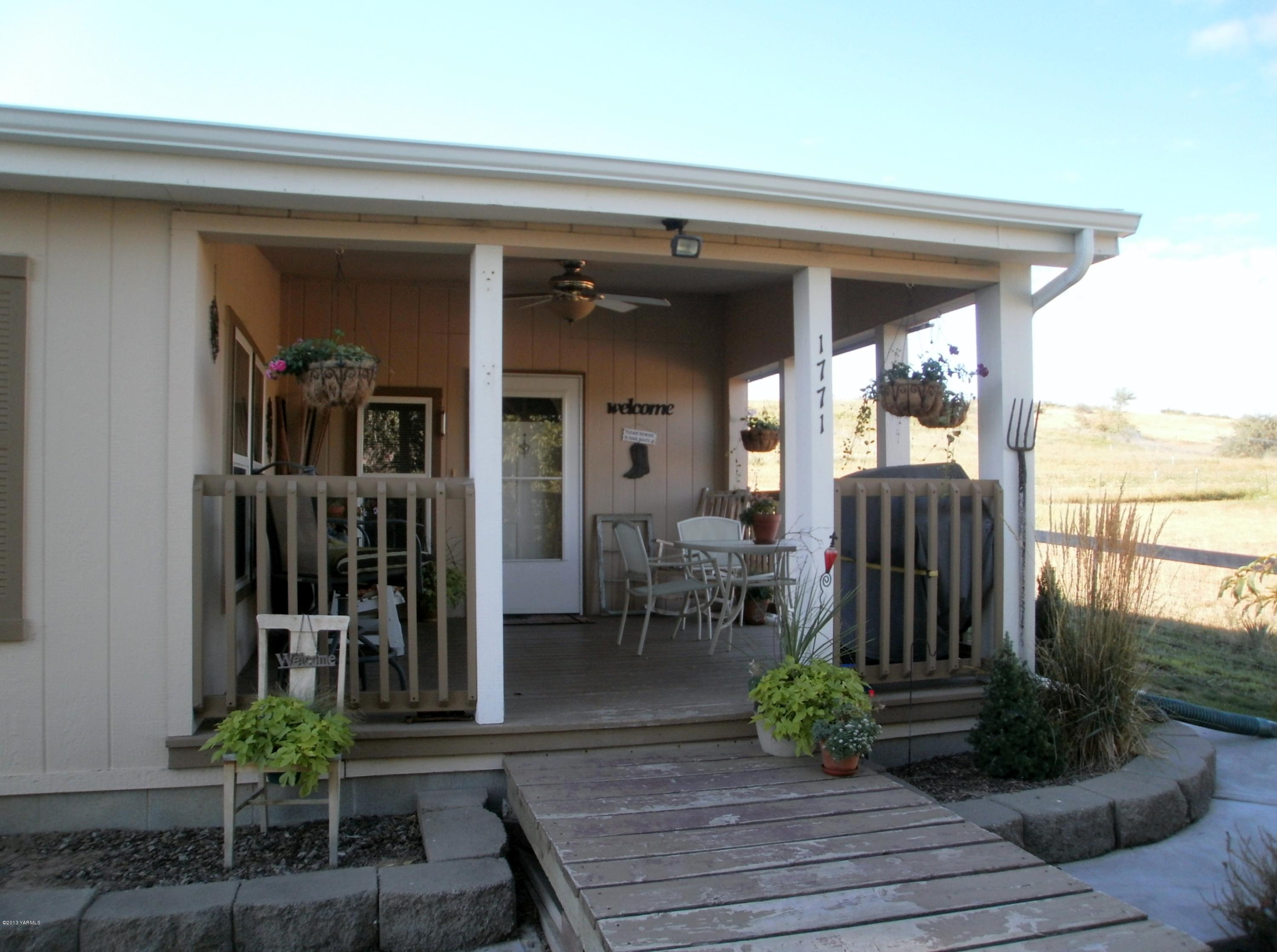 1771 Stone Road Yakima, WA 98908 - Photo 3 of 45 a view of a porch with seating space