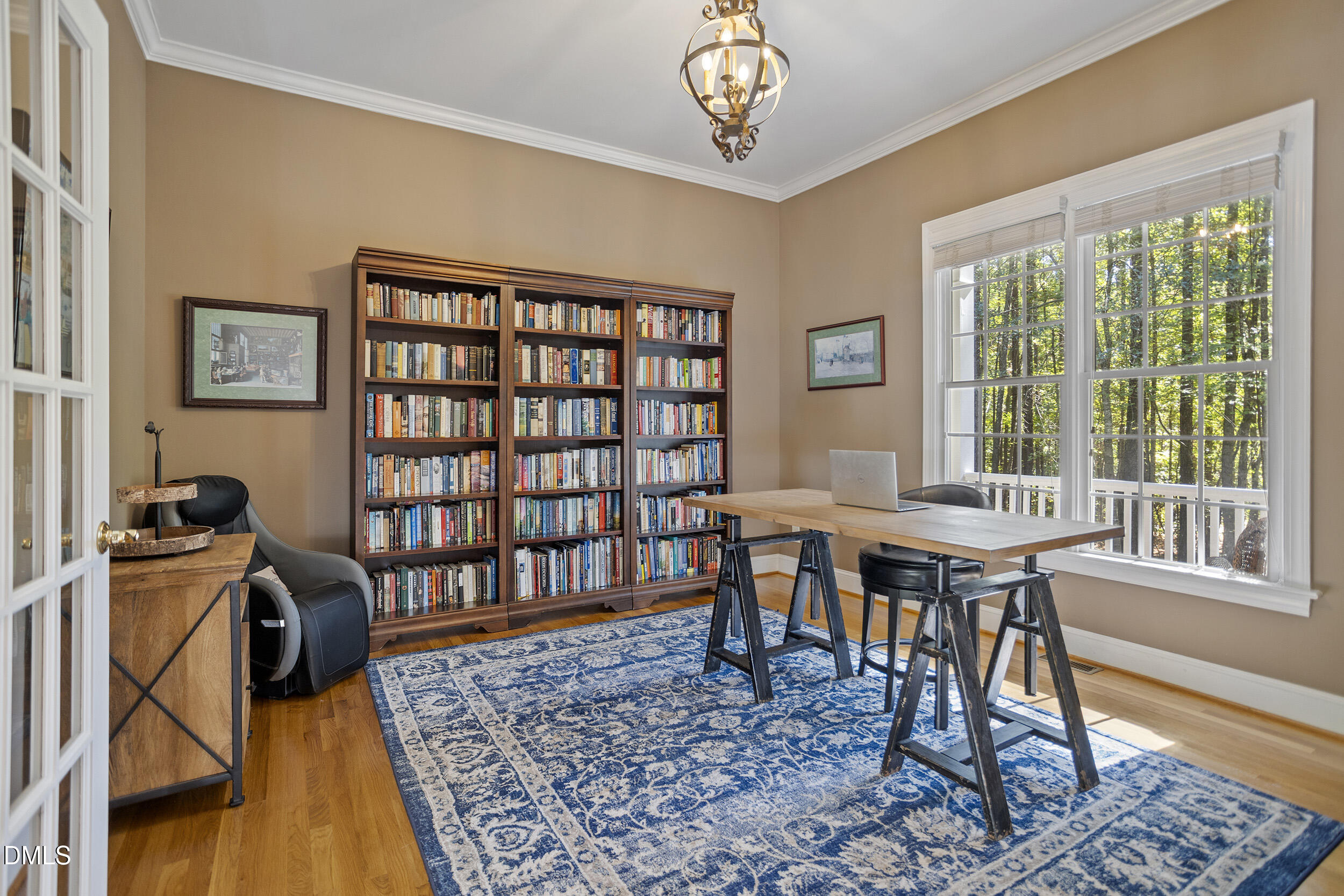 905 Olde Thompson Creek Road Apex, NC 27523 - Photo 17 of 67 a view of a workspace with furniture and a window