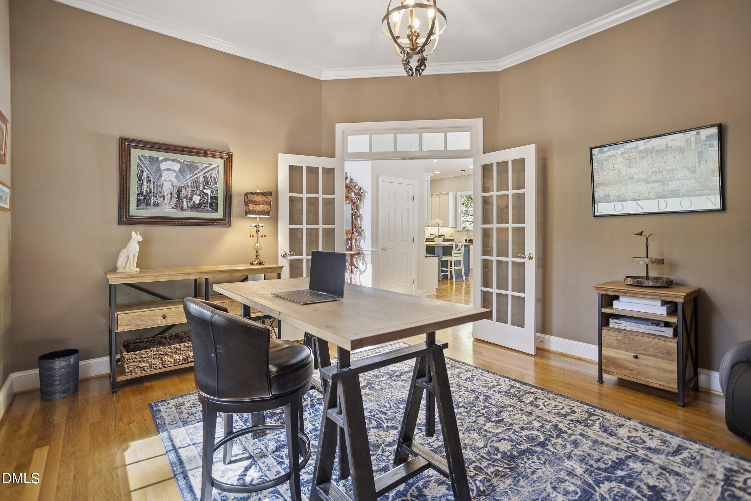 905 Olde Thompson Creek Road Apex, NC 27523 - Photo 18 of 67 a view of a dining room with furniture window and wooden floor